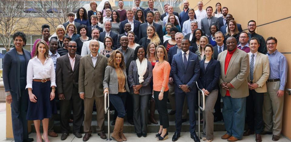 Participants in the Economic Development course pose for picture outside the Global Learning Center