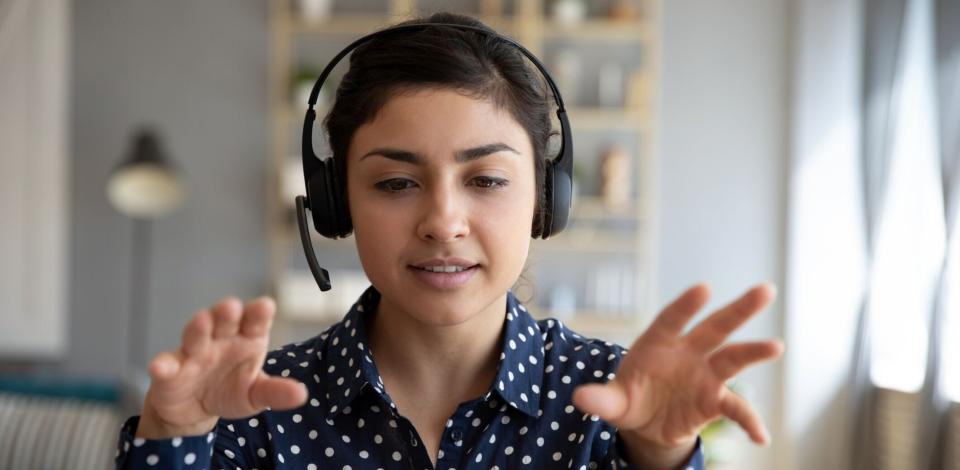 Female learner participating in an online, accredited intensive English program