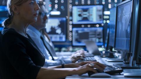 Cyber security professional working in data security center