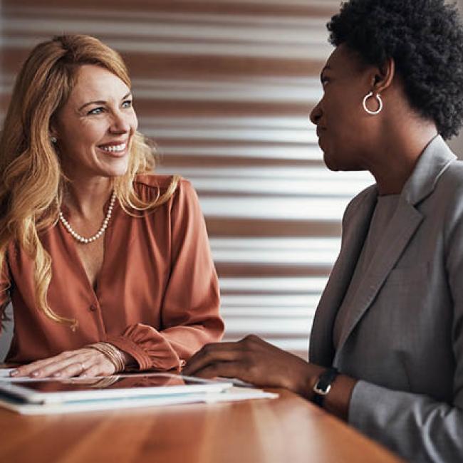 Female professionals having a one-on-one meeting